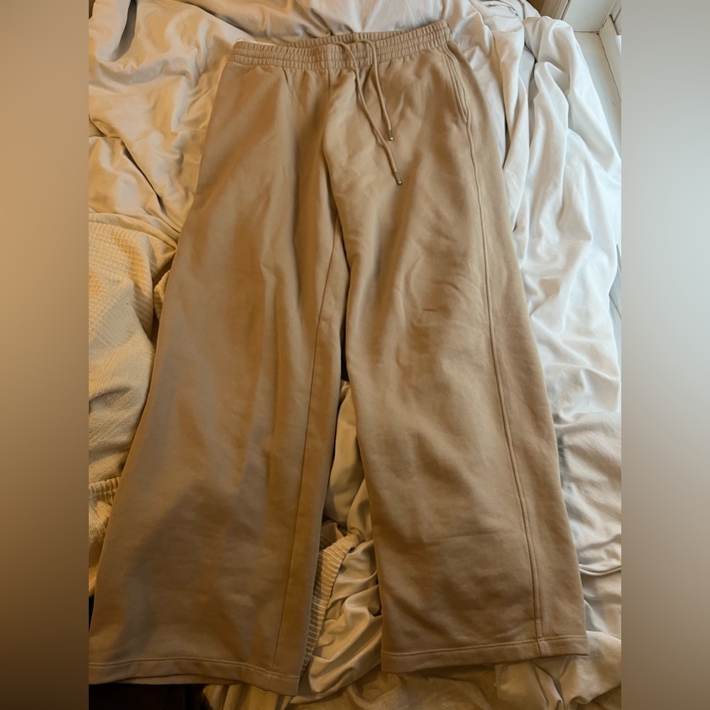 Tan and cream wide legged sweatpants with drawstring